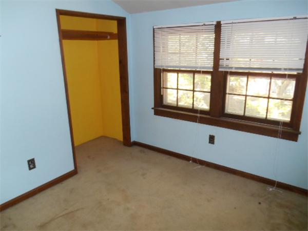126 Thompson Road Weymouth, MA 02191 - Photo 8 of 10 an empty room with windows