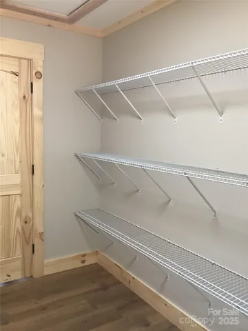 a view of an empty walk in closet