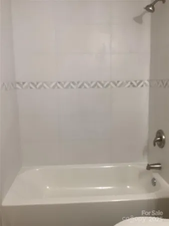 a bathroom with bathtub