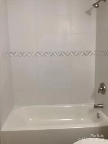 a bathroom with bathtub