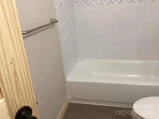 a bathroom with a bathtub