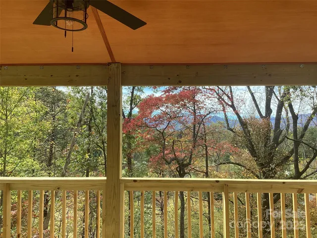 a view of a balcony with an outdoor space