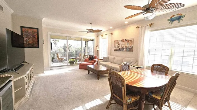 a bedroom with furniture and a flat screen tv
