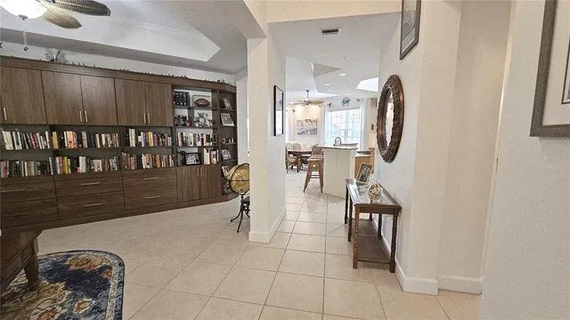 a view of a chairs and a table in a room