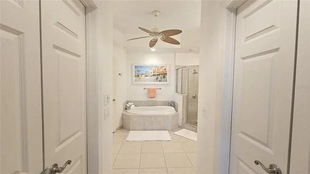 a bathroom with a sink a mirror a bathtub and a toilet