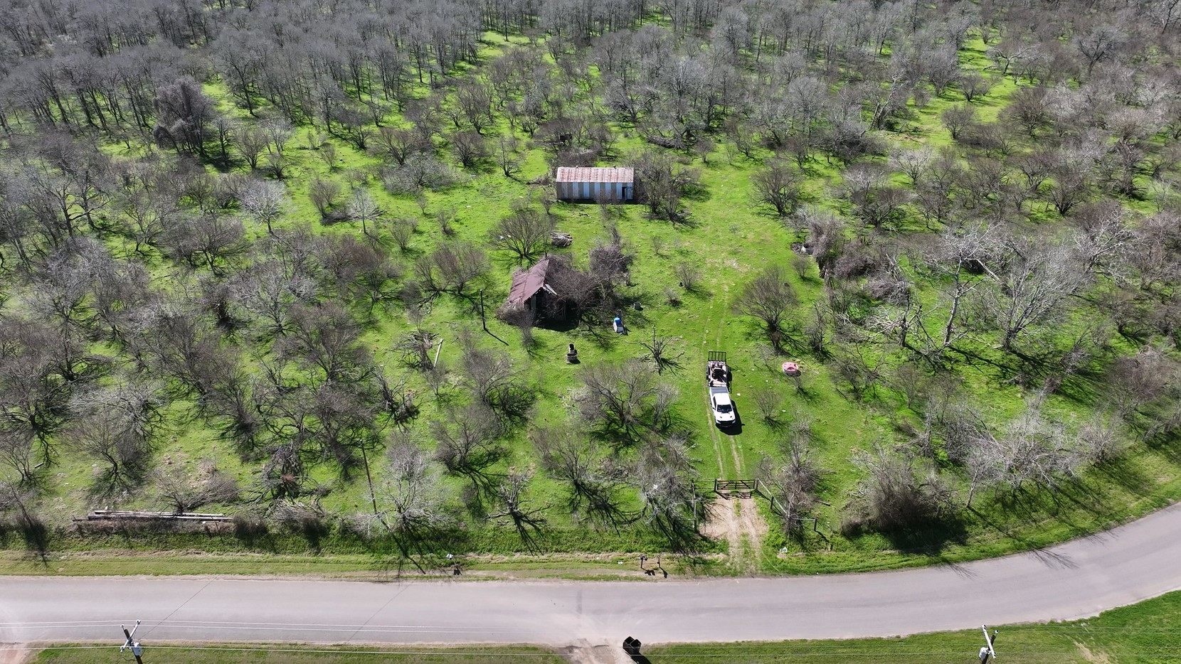 40499 Garrett Road Brookshire, TX 77423 - Photo 18 of 29 a view of a garden with a bench