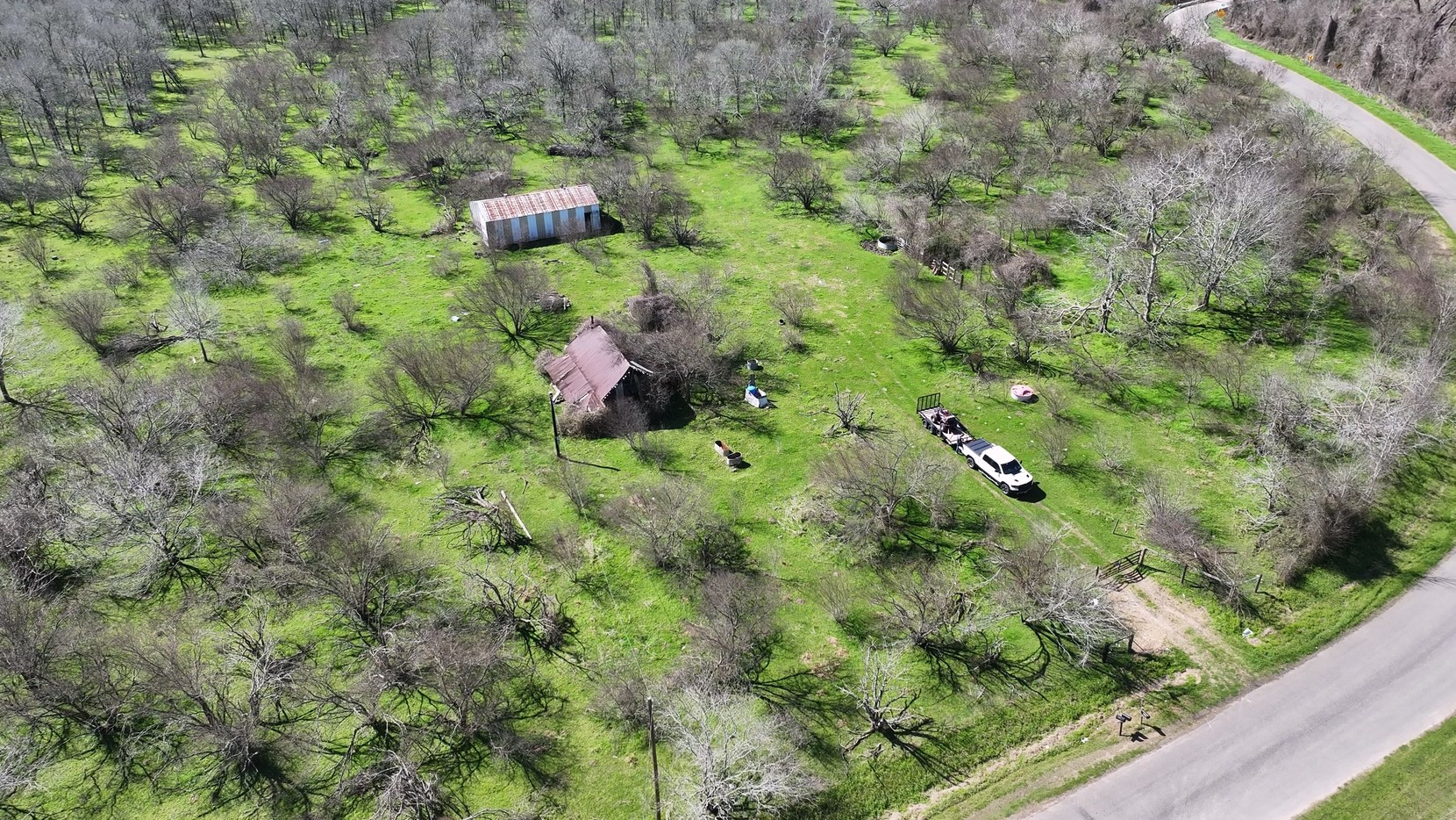 40499 Garrett Road Brookshire, TX 77423 - Photo 19 of 29 a backyard of a house with lots of green space