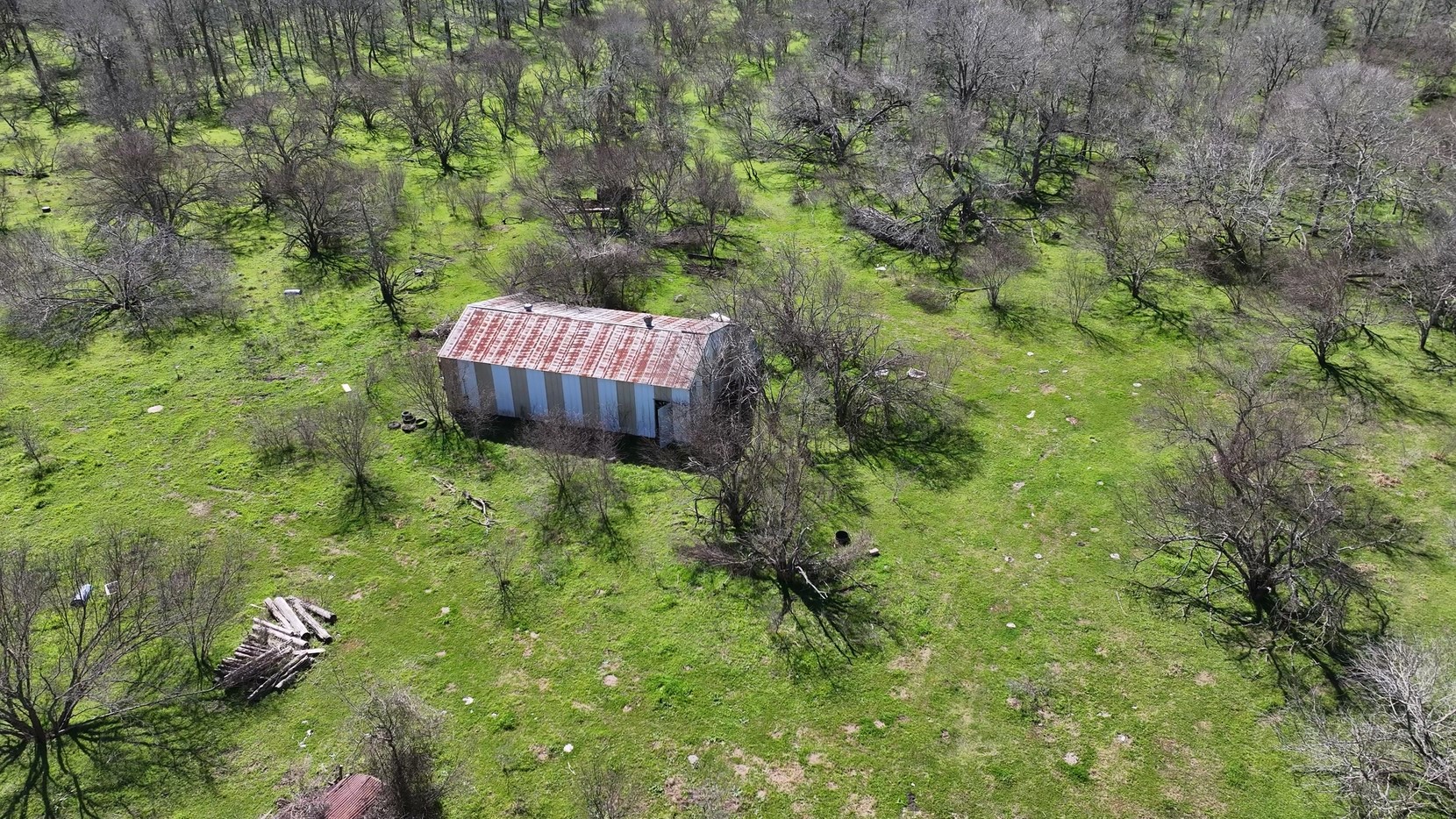 40499 Garrett Road Brookshire, TX 77423 - Photo 20 of 29 a view of a backyard with wooden fence