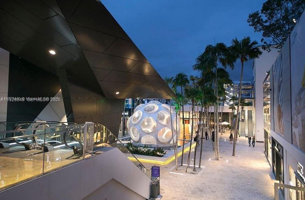 524 Northeast 65th Street, Unit 2 Miami, FL 33138 - Photo 20 of 24 a view of a chairs and table in patio