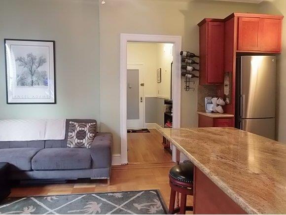 7002 Ridge Boulevard, Unit F12 Brooklyn, NY 11209 - Photo 1 of 12 Open living room/kitchen