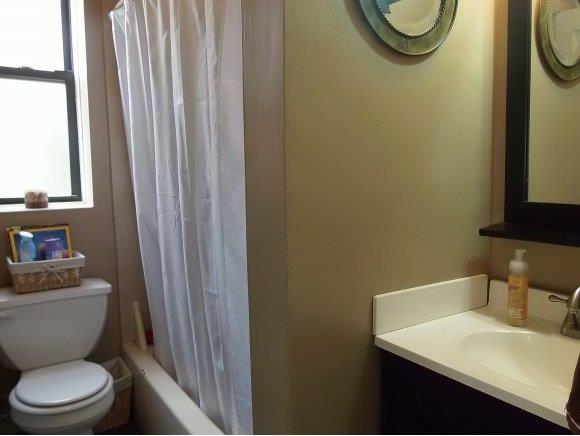 7002 Ridge Boulevard, Unit F12 Brooklyn, NY 11209 - Photo 3 of 12 Renovated full bath