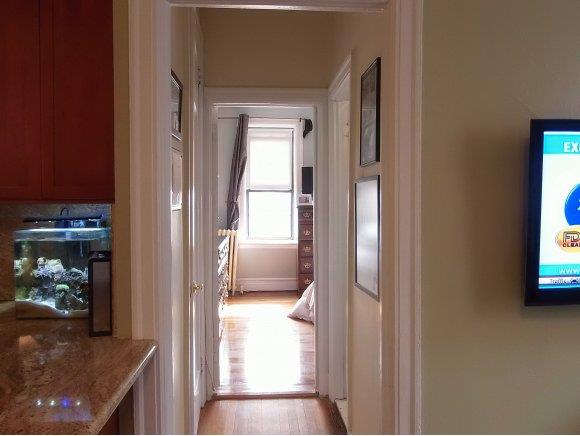 7002 Ridge Boulevard, Unit F12 Brooklyn, NY 11209 - Photo 7 of 12 Hallway looking toward bedroom