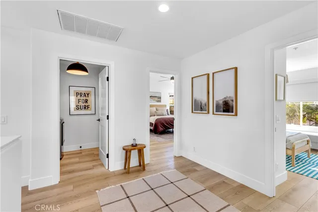a bedroom with a bed and a view of bathroom