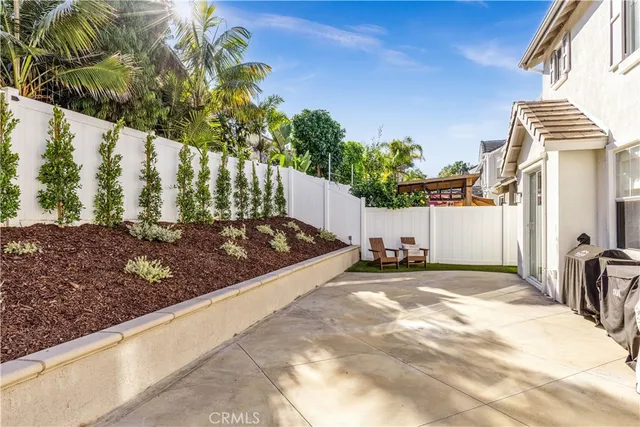 a view of a back yard of a house