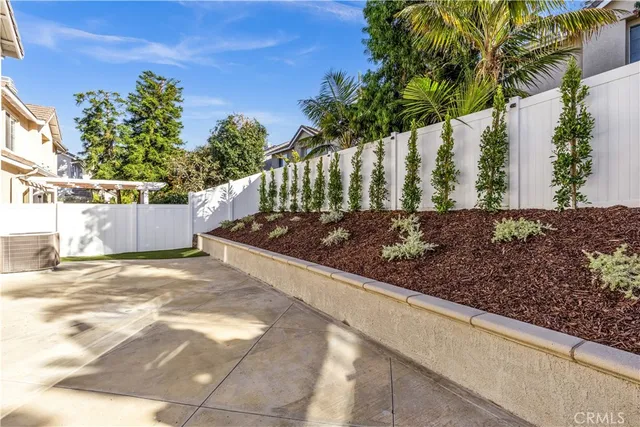 a view of a backyard of a house