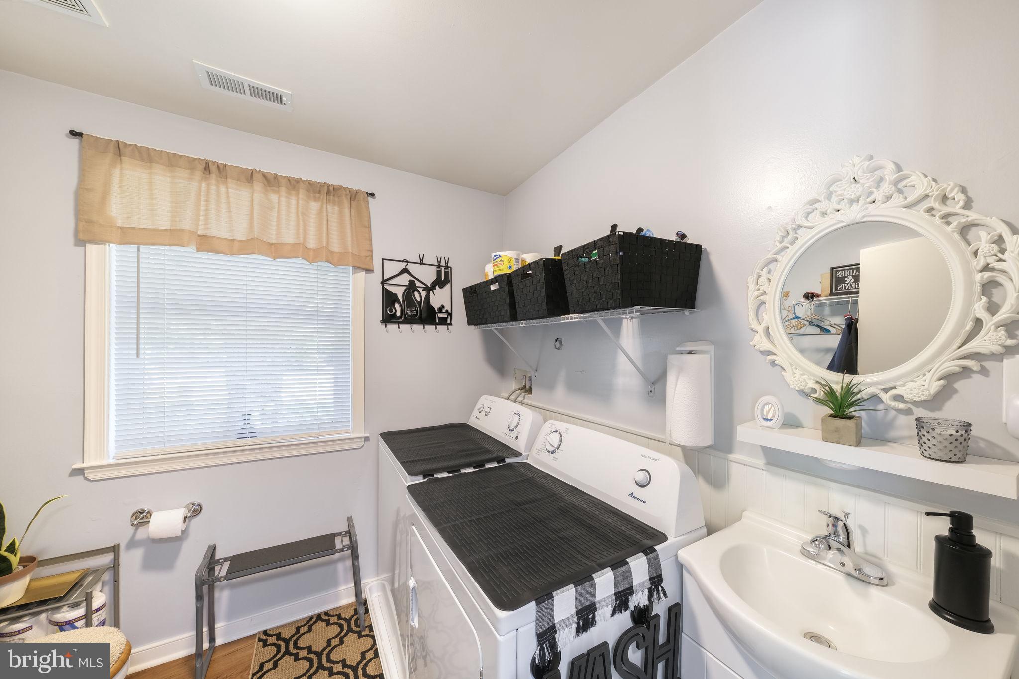 20384 Mary Ball Road White Stone, VA 22578 - Photo 25 of 31 Bright and functional laundry space.