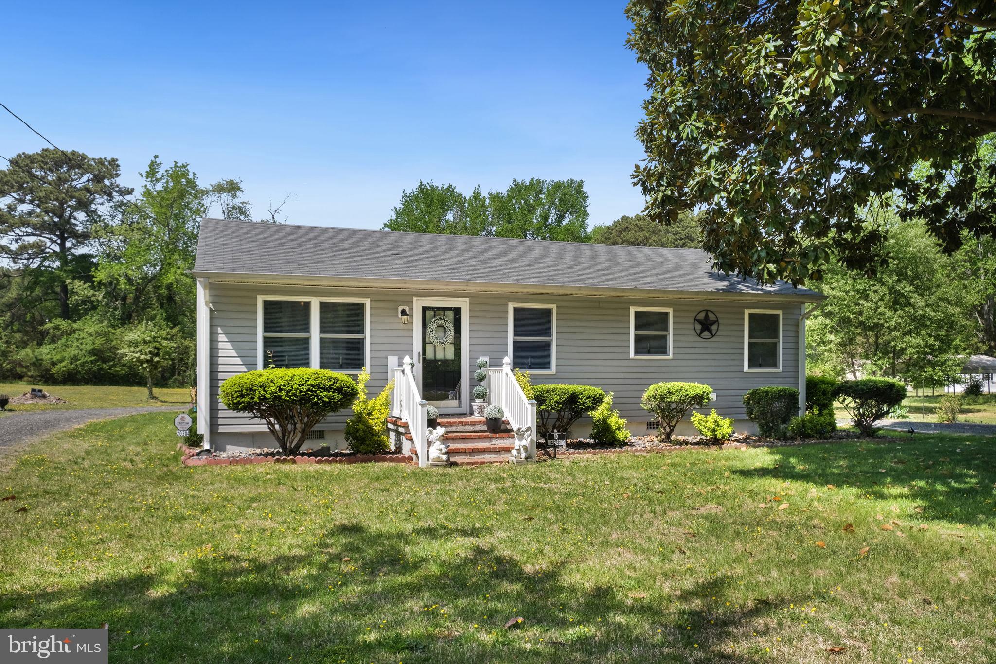 20384 Mary Ball Road White Stone, VA 22578 - Photo 31 of 31 Charming home with lush greenery.