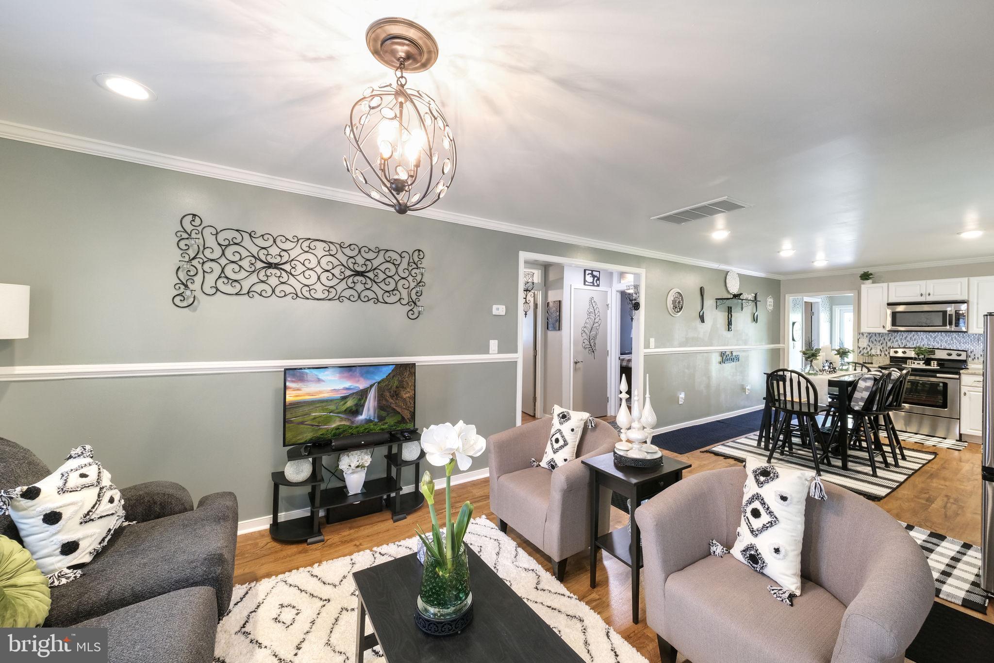 20384 Mary Ball Road White Stone, VA 22578 - Photo 6 of 31 Charming open-concept living space.