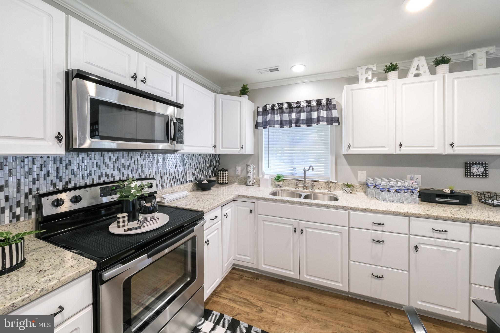 20384 Mary Ball Road White Stone, VA 22578 - Photo 7 of 31 Modern kitchen with stylish finishes.