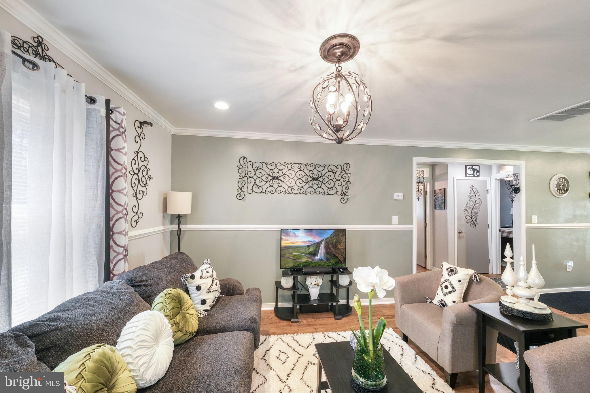 20384 Mary Ball Road White Stone, VA 22578 - Photo 9 of 31 Charming living space with elegant decor.