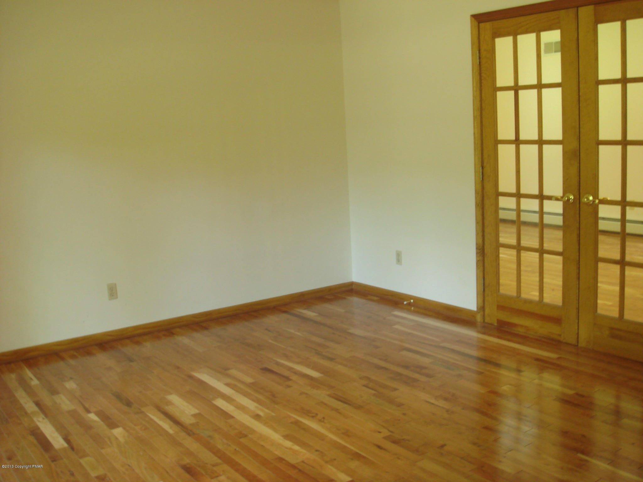 314 Village Road Effort, PA 18330 - Photo 7 of 19 Dining Room French Doors into Living Rm
