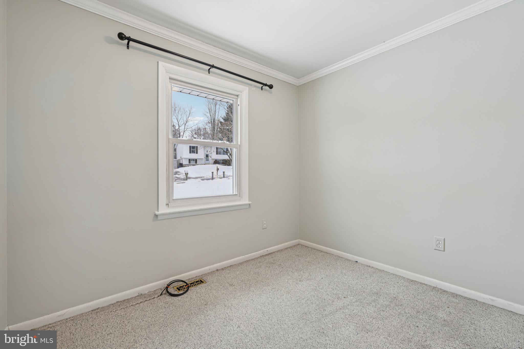 917 Century Street Hampstead, MD 21074 - Photo 20 of 45 a view of an empty room with a window