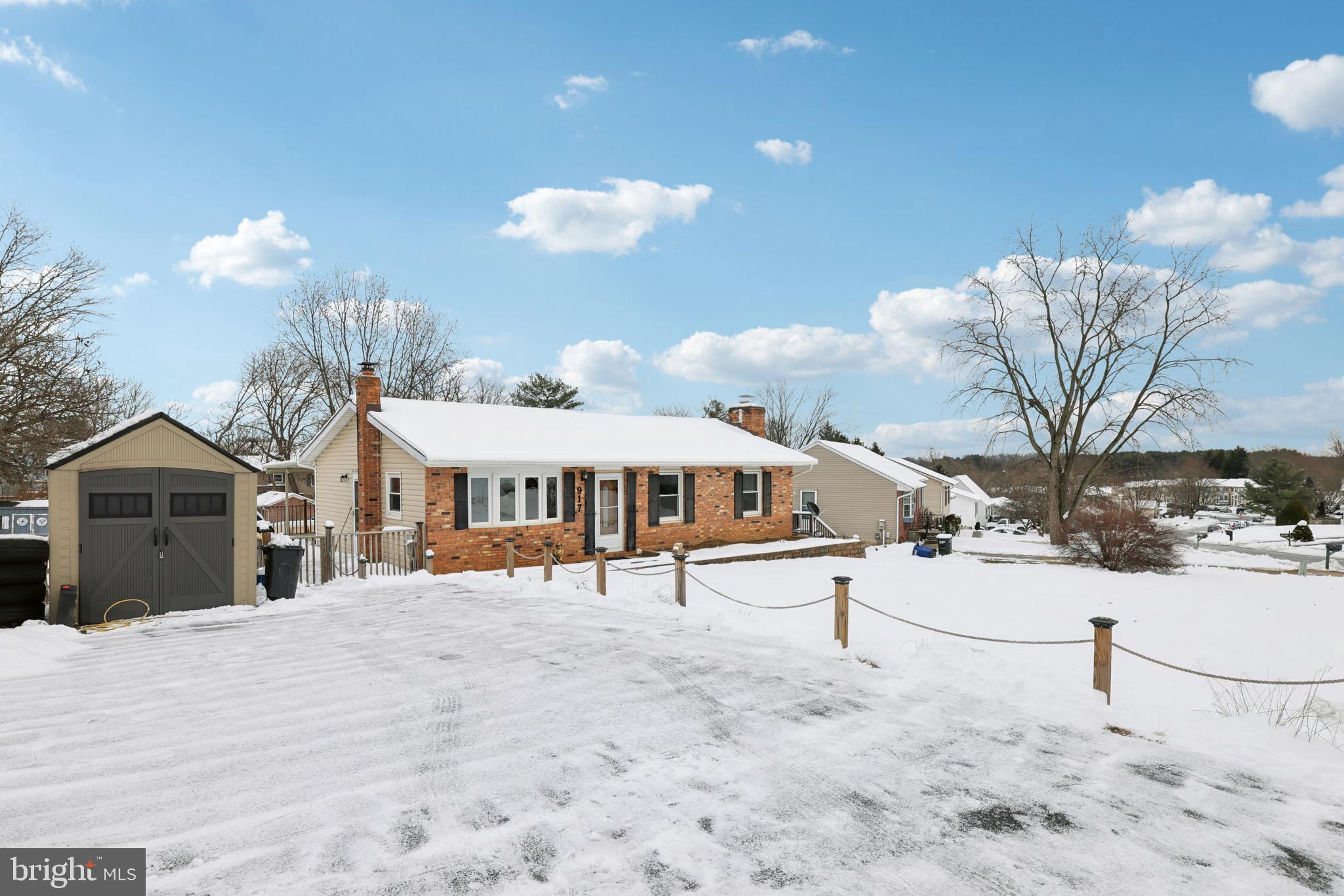 917 Century Street Hampstead, MD 21074 - Photo 2 of 45 a view of a house with a snow in the yard