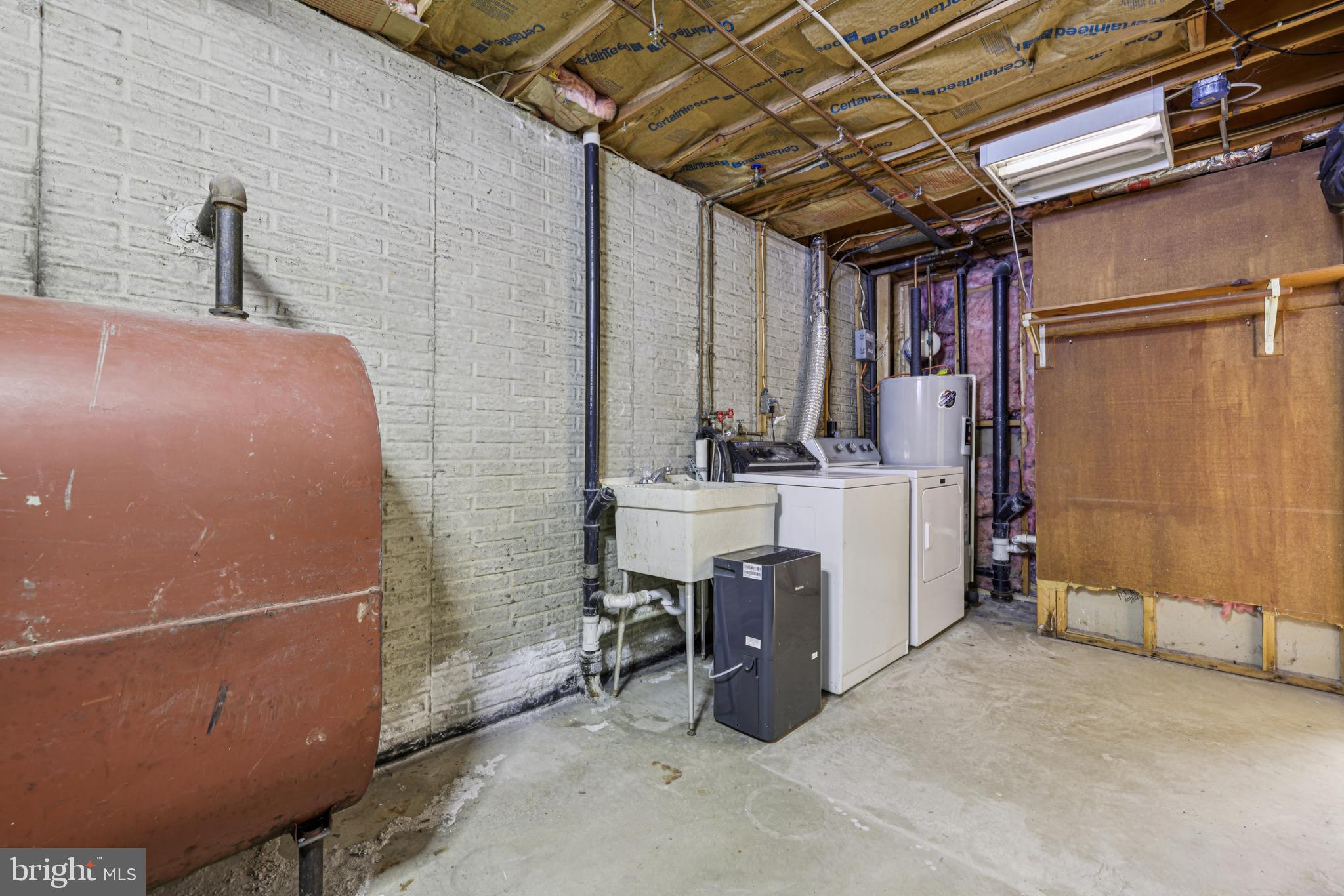 917 Century Street Hampstead, MD 21074 - Photo 27 of 45 a view of a storage & utility room