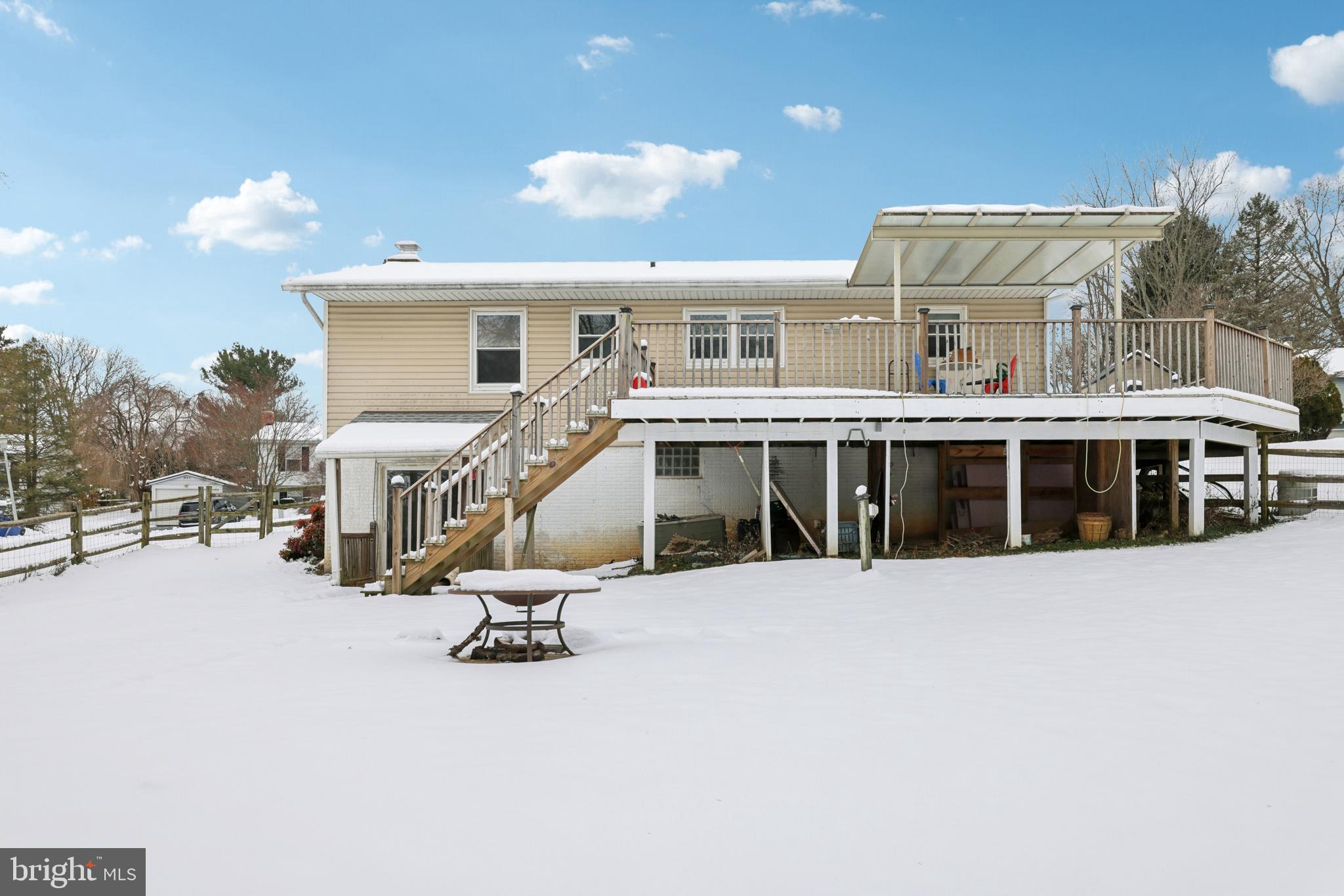 917 Century Street Hampstead, MD 21074 - Photo 41 of 45 a view of a house with swimming pool and sitting area