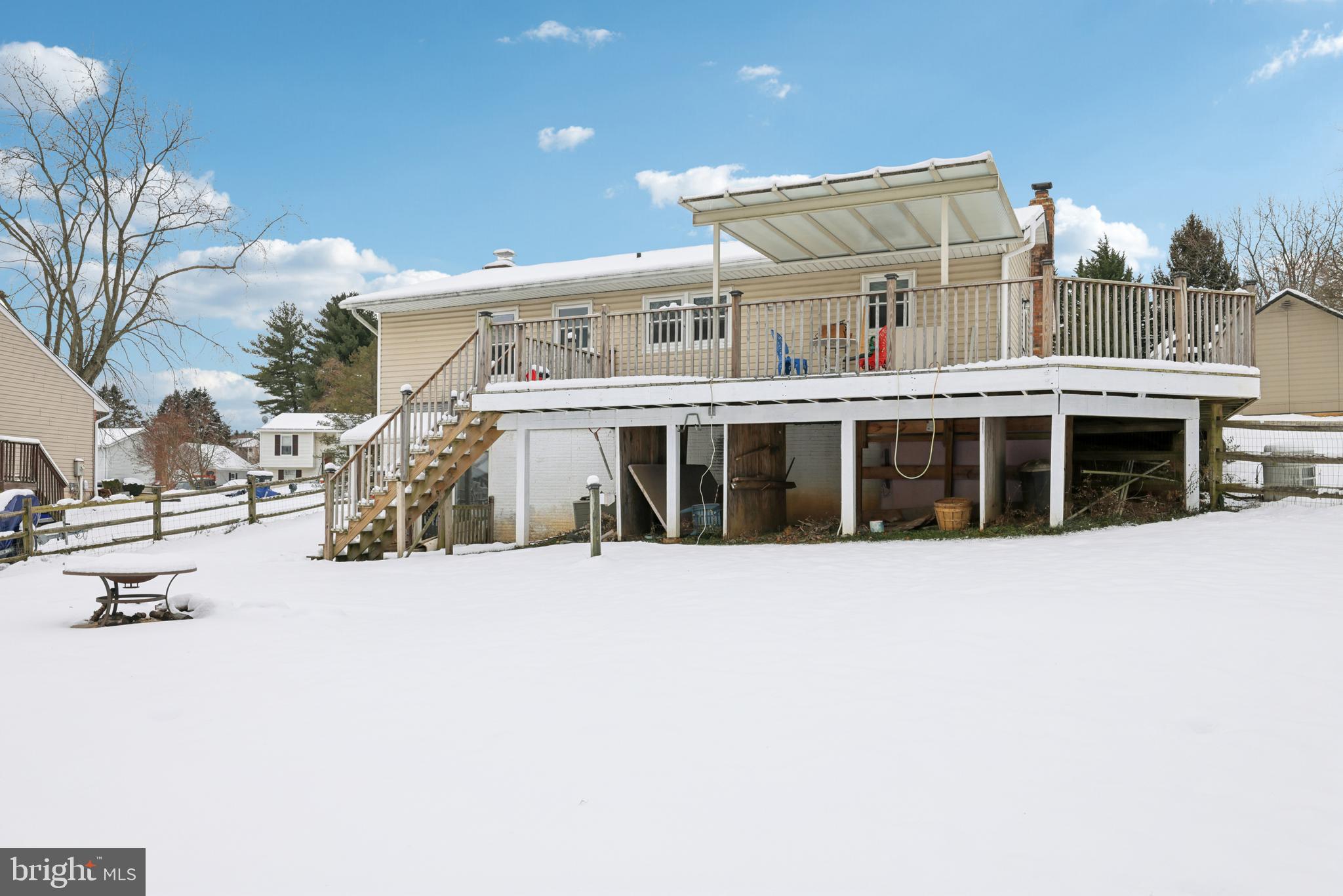 917 Century Street Hampstead, MD 21074 - Photo 44 of 45 a large building with a large window and parking