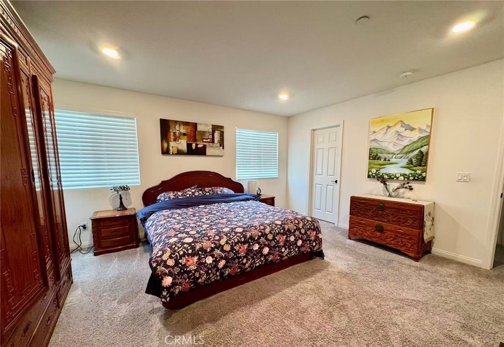10664 Busch Street Spring Valley, CA 91978 - Photo 4 of 14 a bedroom with a bed and a dresser