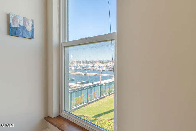 3101 Peninsula Road, Unit 115 Oxnard, CA 93035 - Photo 15 of 36 a view of a glass door with a balcony