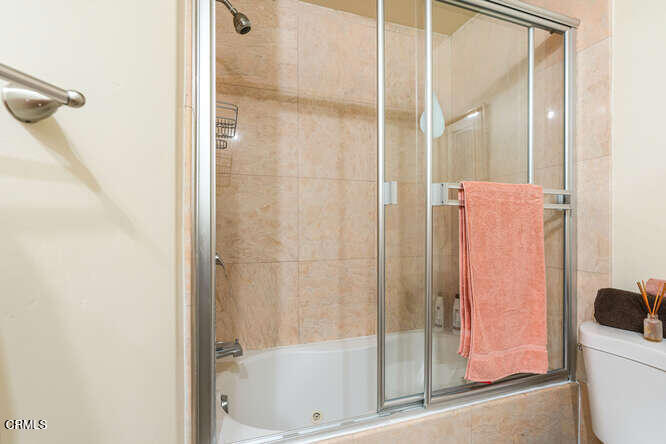 3101 Peninsula Road, Unit 115 Oxnard, CA 93035 - Photo 21 of 36 a bathroom with a shower and a bath tub