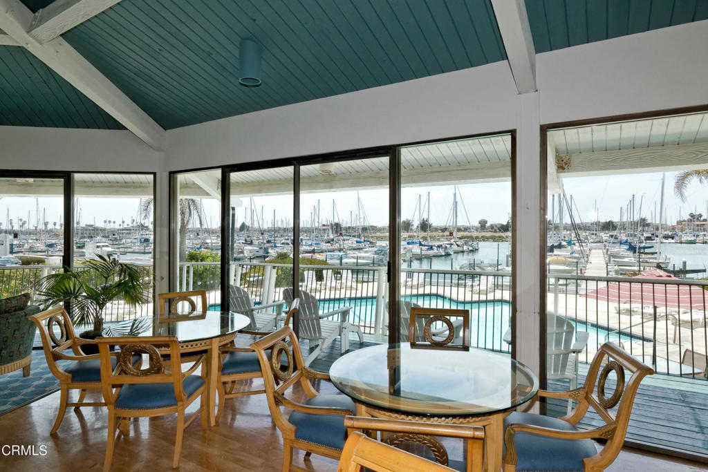 3101 Peninsula Road, Unit 115 Oxnard, CA 93035 - Photo 24 of 36 a dining room with furniture window and outside view