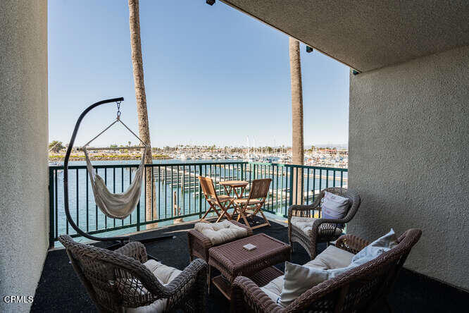 3101 Peninsula Road, Unit 115 Oxnard, CA 93035 - Photo 4 of 36 a view of a balcony with furniture