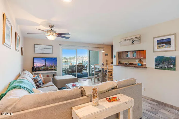 a living room with furniture and a table