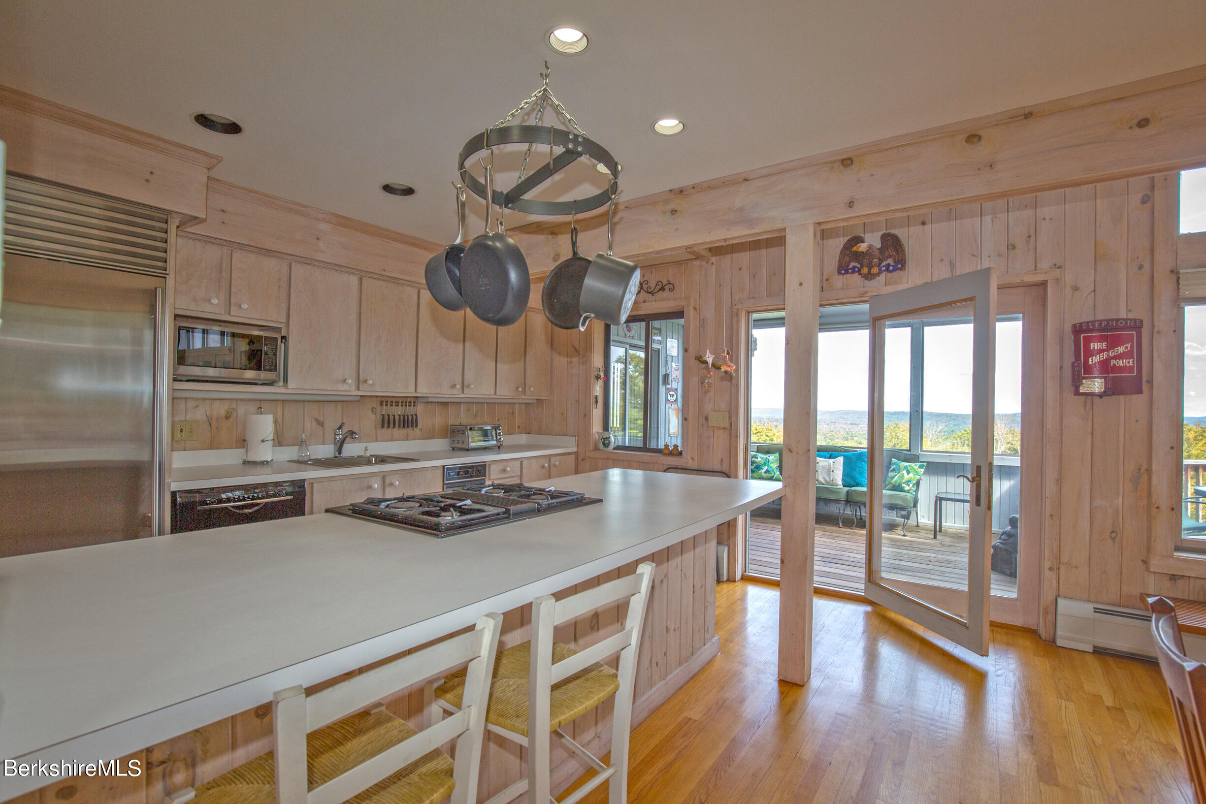 795 Moberg Road Becket, MA 01223 - Photo 11 of 41 a kitchen with a counter space a sink appliances and cabinets