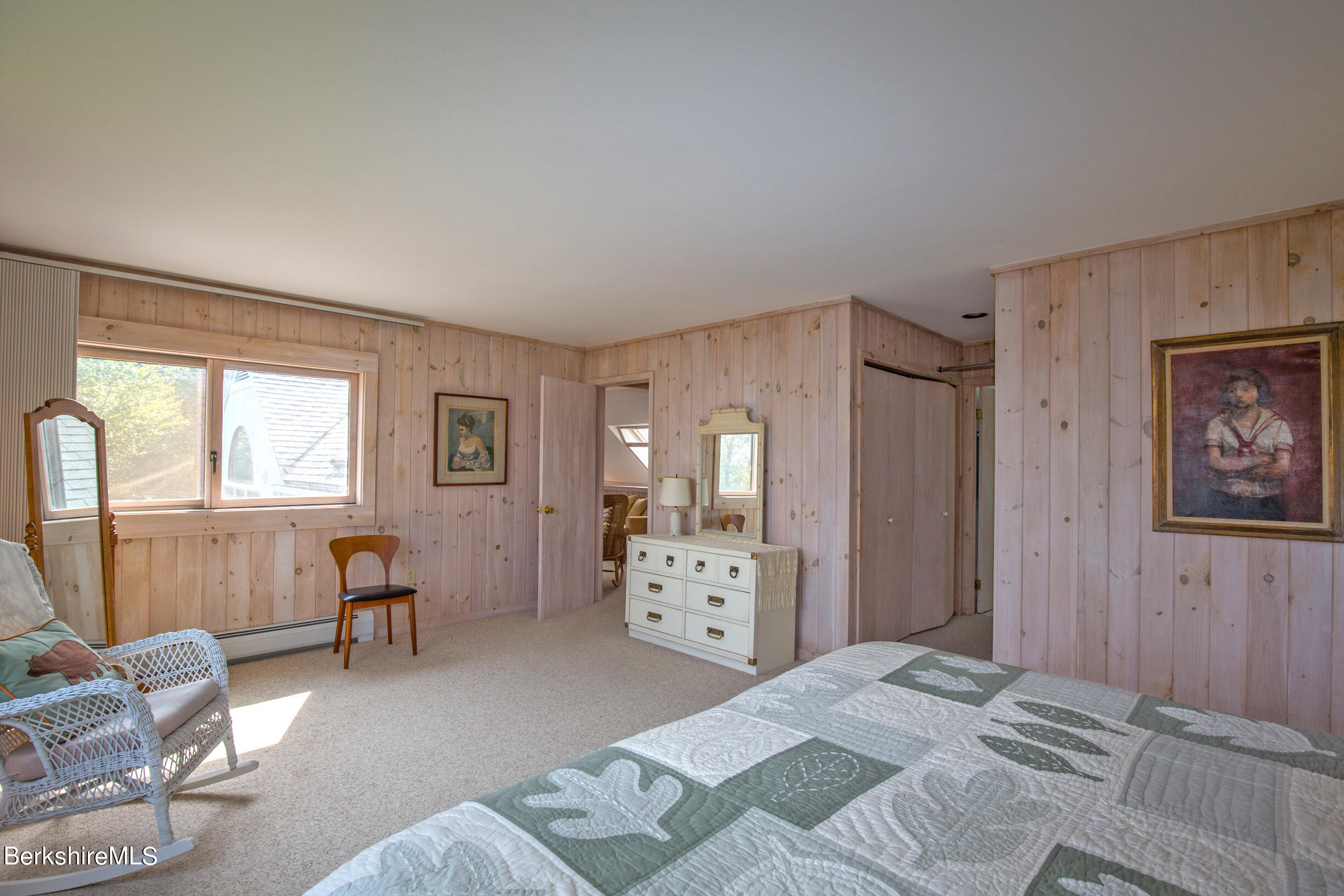 795 Moberg Road Becket, MA 01223 - Photo 23 of 41 a bedroom with a bed and furniture