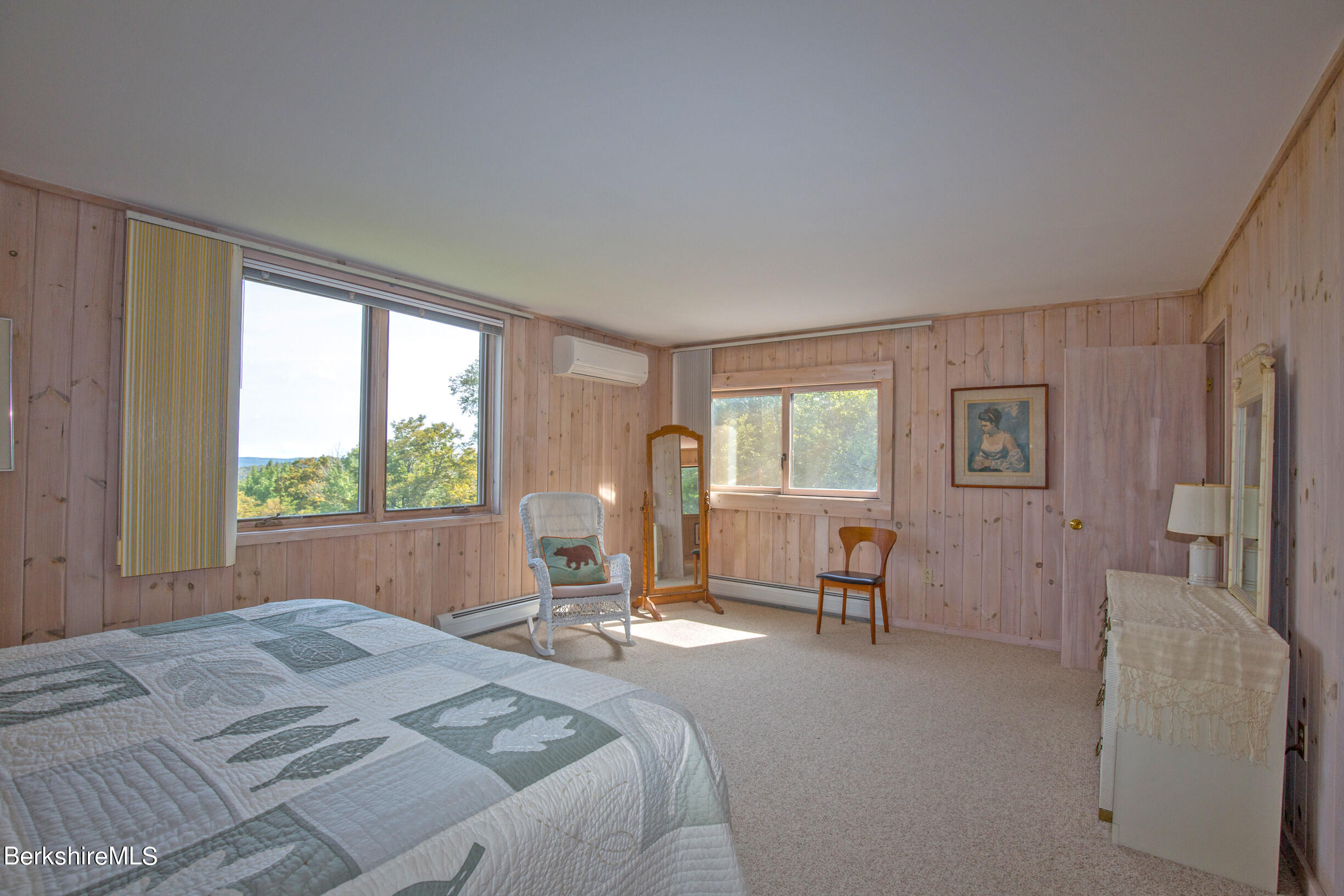 795 Moberg Road Becket, MA 01223 - Photo 24 of 41 a bedroom with a bed and a large window