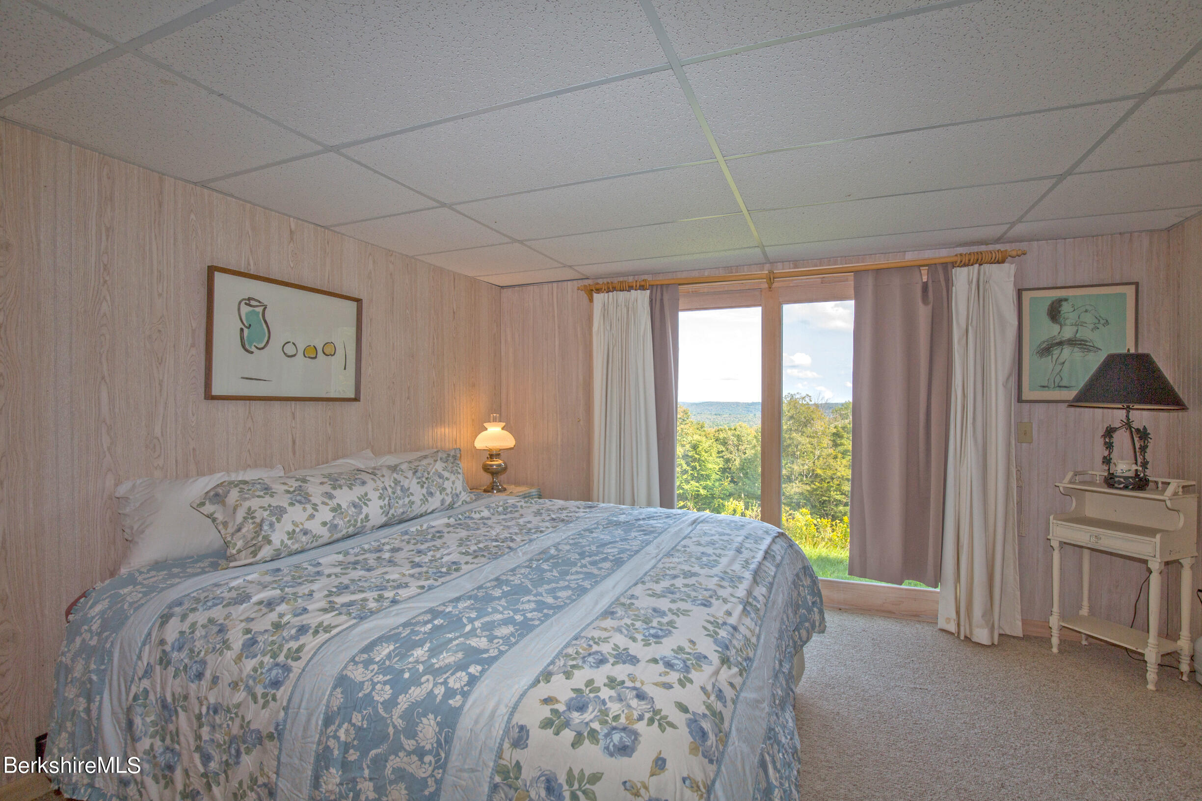 795 Moberg Road Becket, MA 01223 - Photo 33 of 41 a bedroom with a large bed and a window