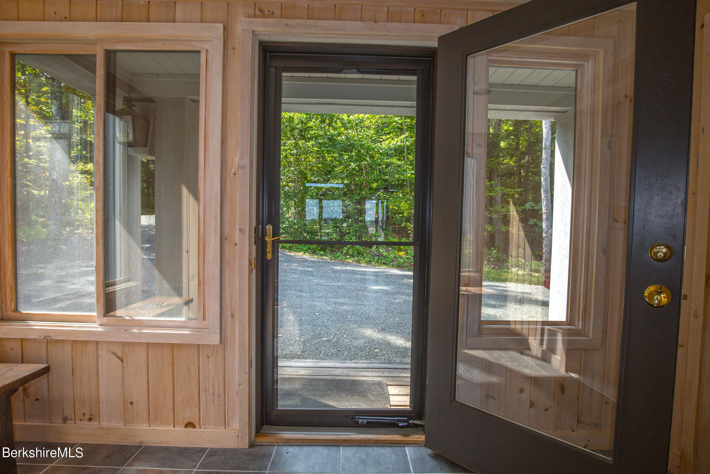 795 Moberg Road Becket, MA 01223 - Photo 4 of 41 a view of a wooden door