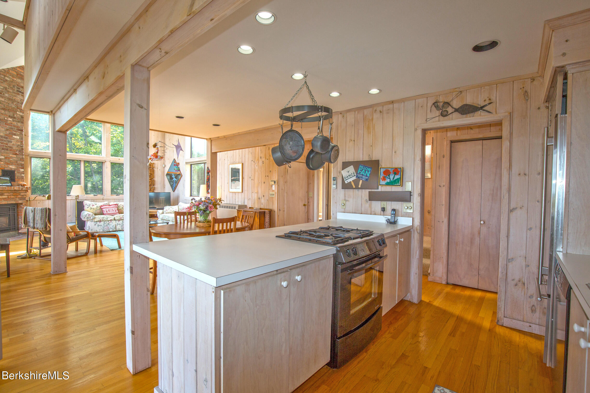 795 Moberg Road Becket, MA 01223 - Photo 10 of 41 a kitchen with a stove and a refrigerator