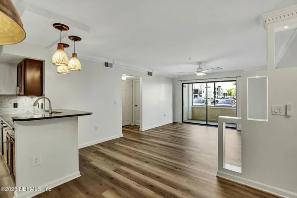 a view of an entryway with a chandelier