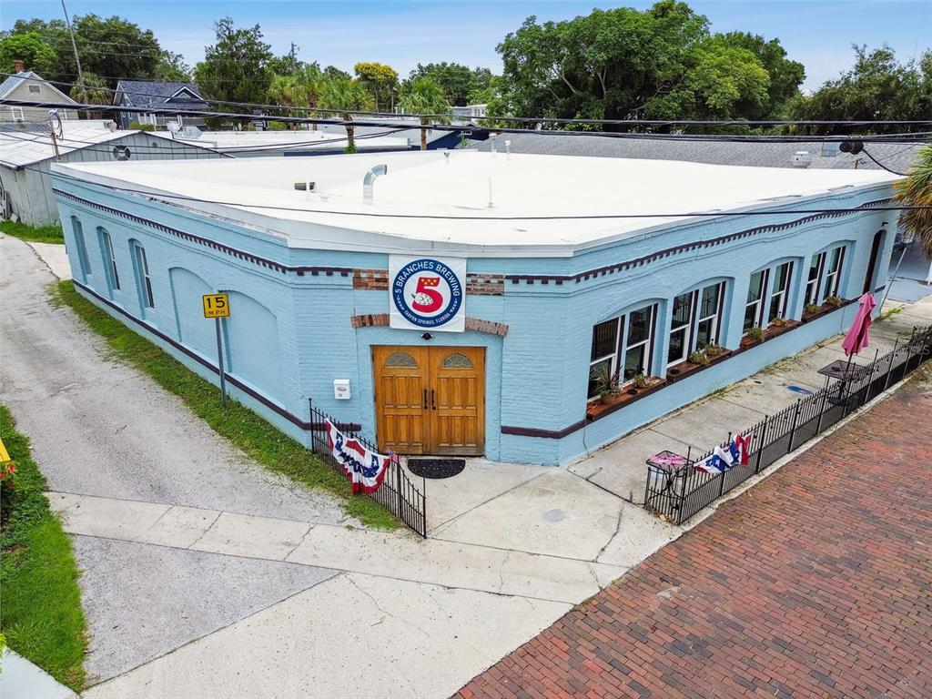 131 Hibiscus Street Tarpon Springs, FL 34689 - Photo 1 of 11 a view of a patio with a table and chairs