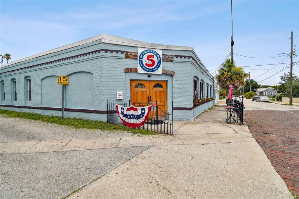 131 Hibiscus Street Tarpon Springs, FL 34689 - Photo 2 of 11 a view of the street with chairs