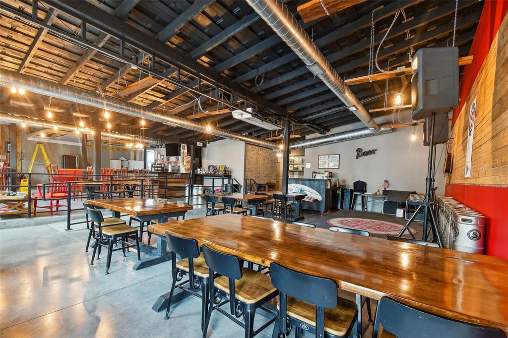 131 Hibiscus Street Tarpon Springs, FL 34689 - Photo 4 of 11 a outdoor space with lots of furniture and lots of furniture