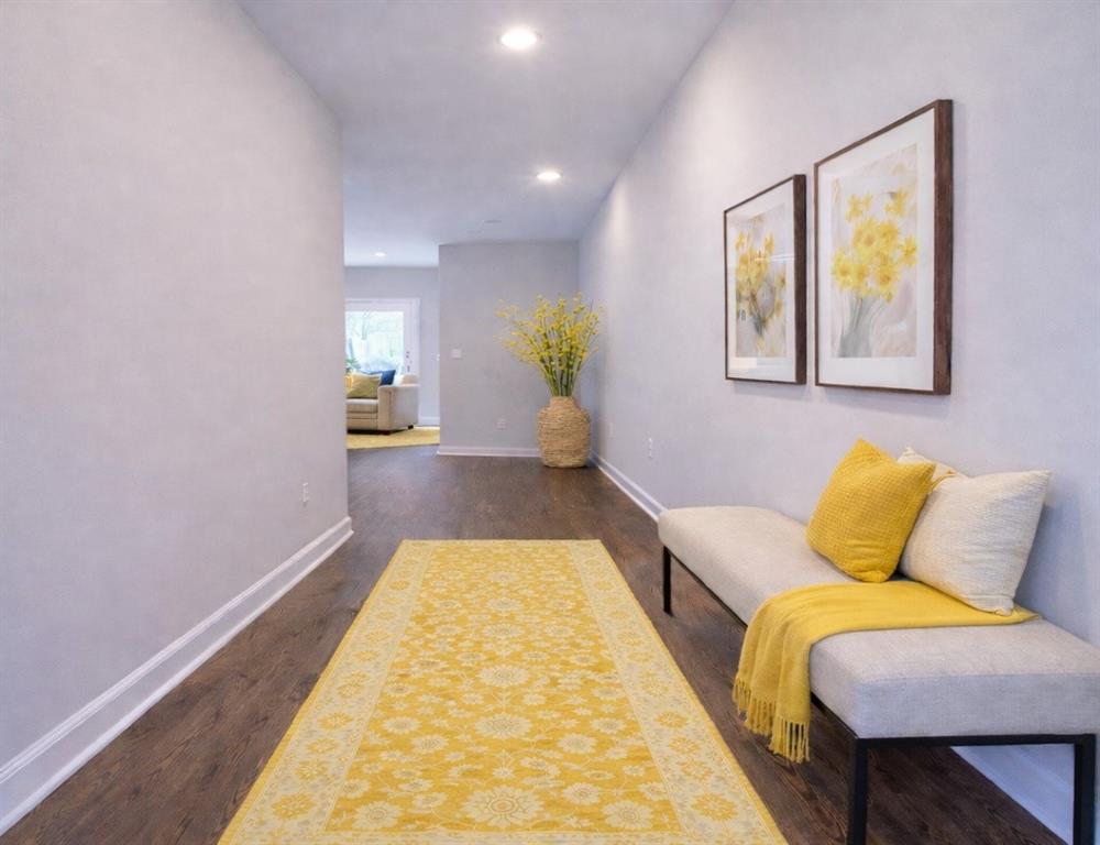 284 Switcher Court Union City, GA 30291 - Photo 2 of 36 a hallway with a couch and potted plant