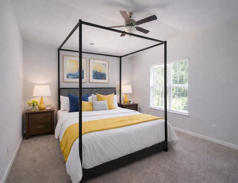 284 Switcher Court Union City, GA 30291 - Photo 5 of 36 a bedroom with a bed window and wall painting