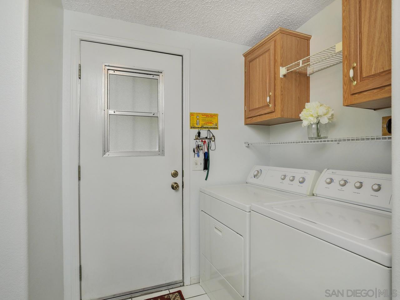 9500 Harritt Road, Unit SPC 84 Lakeside, CA 92040 - Photo 21 of 25 Includes a utility sink and direct access from the carport