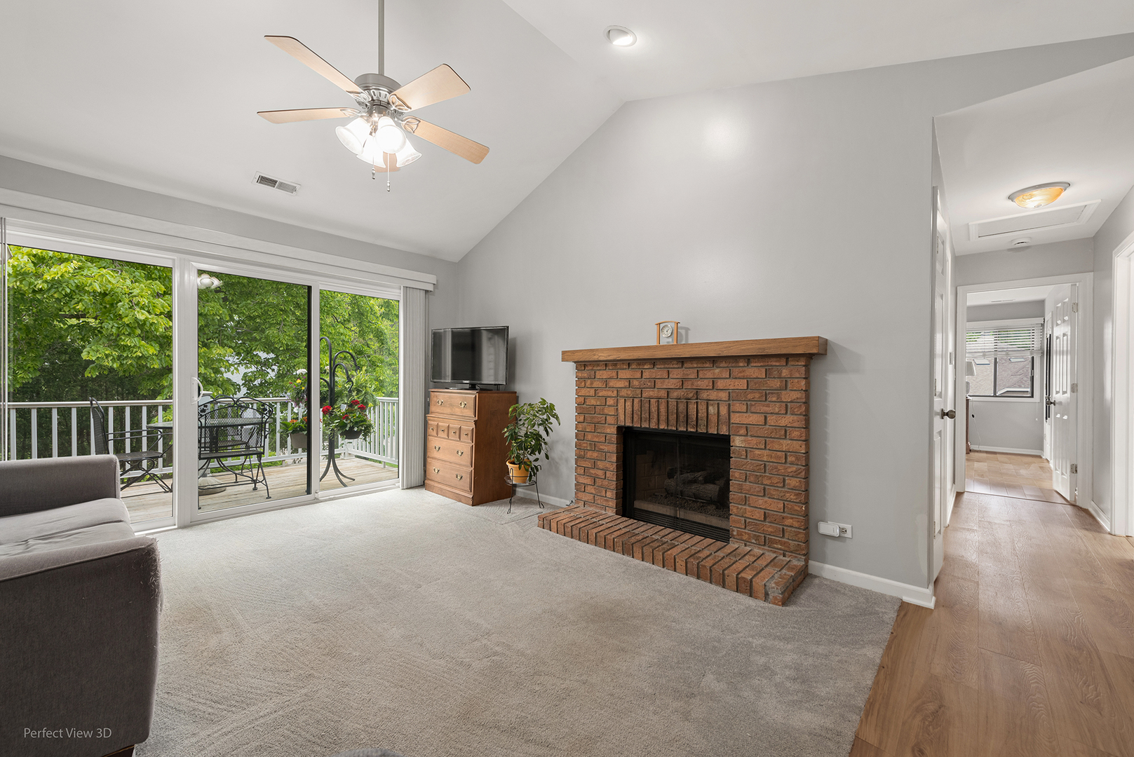 -n120 Windermere Road, Unit 2008 Winfield, IL 60190 - Photo 4 of 23 a view of an empty room with a fireplace and a large window